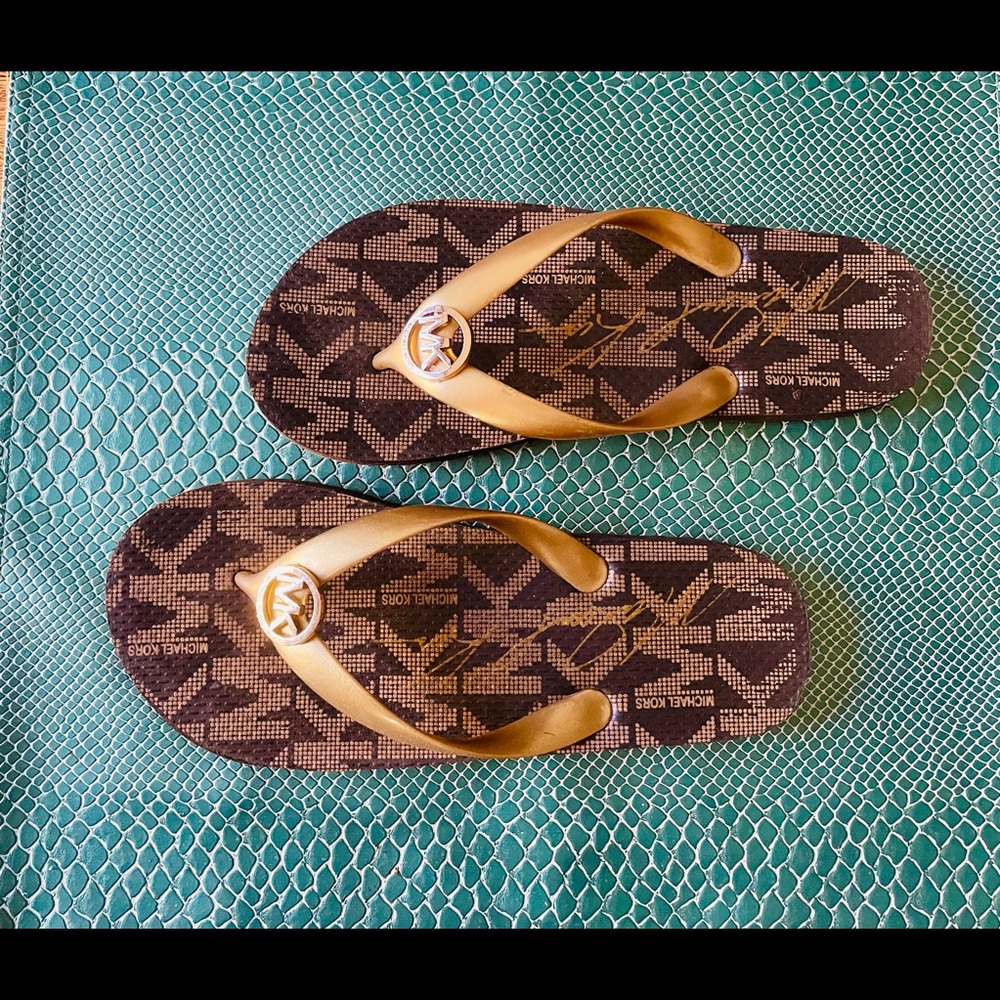 Michael Kors gold flip-flop with Metal MK Logo